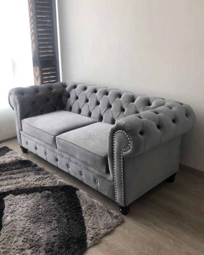 Classic grey Chesterfield sofa repairing and upholstery